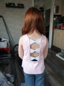 Symönster tröja med Rosett