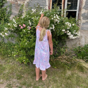 Symönster lilltöseklänning med axelband